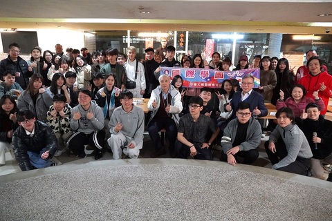 International Foundation Program students gather with faculty for a group photo, capturing warm Chinese New Year memories in the festive reunion atmosphere.Image
